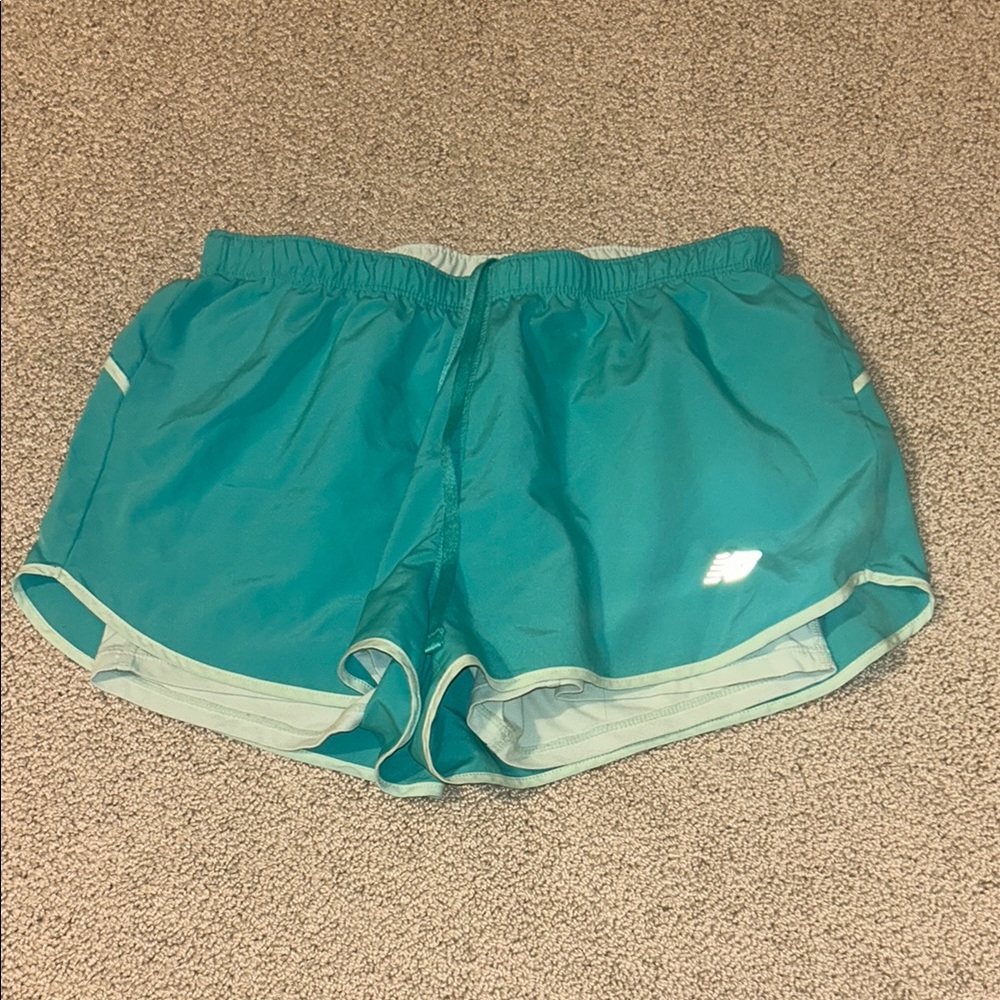 New Balance Green Athletic Shorts with Elastic Waistband and Built-in Liner